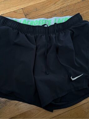 Nike Black Shorts with Neon Green Waistband and White Swoosh